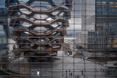 The Vessel stairway sculpture sits empty on a cloudy evening at Hudson Yards in Manhattan.