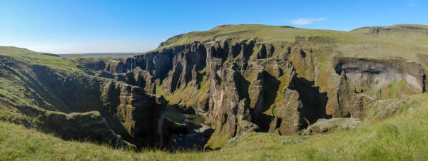 Panoramic view of Fjadrargljufur canyon in Iceland  with the Eldhraun lava field in the distance.