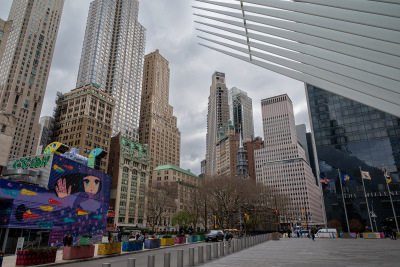 Lower Manhattan under the ribs of the Oculus on a cloudy spring day.