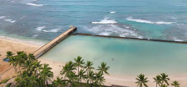 View of the Waikiki Walkway at Kuhio Beach in Honolulu