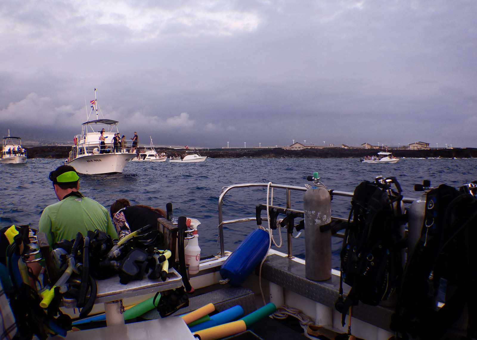 View from a dive boat near Kona airport on the Big Island of Hawaii, preparing to swim with manta rays.