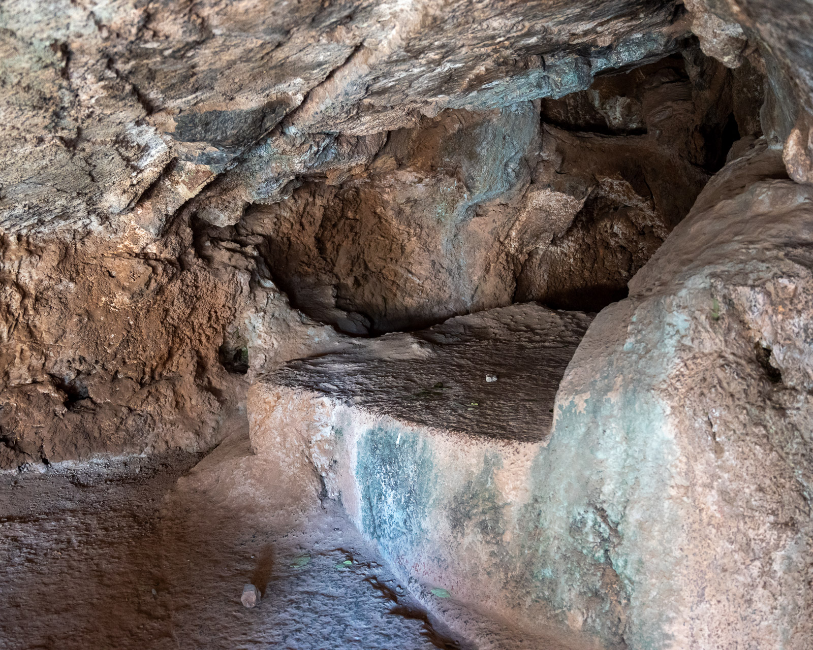 Naturally cooled cave with carved platform where mummies were prepared at Q'enqo