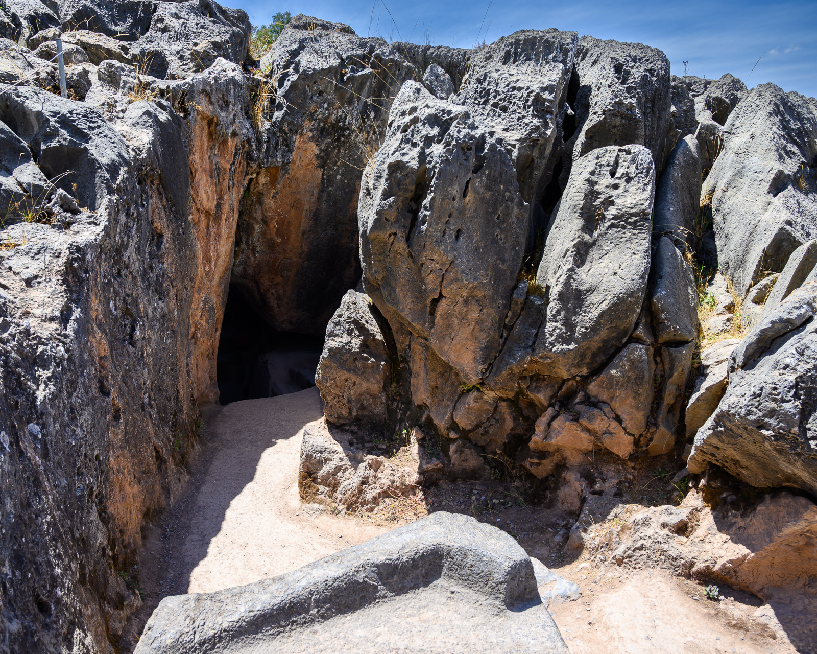 Entrance to the cave at Q'enqo in a large brain-like rock formation.