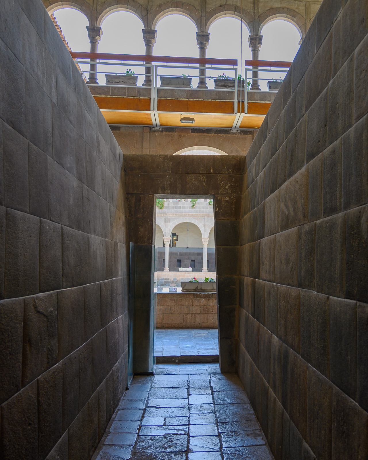 A preserved Incan hall with fine stonework within the Qorikancha museum