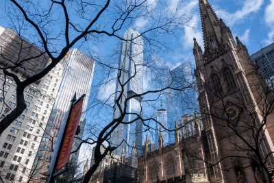 Bare branches screen the view of Trinity Church in Lower Manhattan near the World Trade Center.