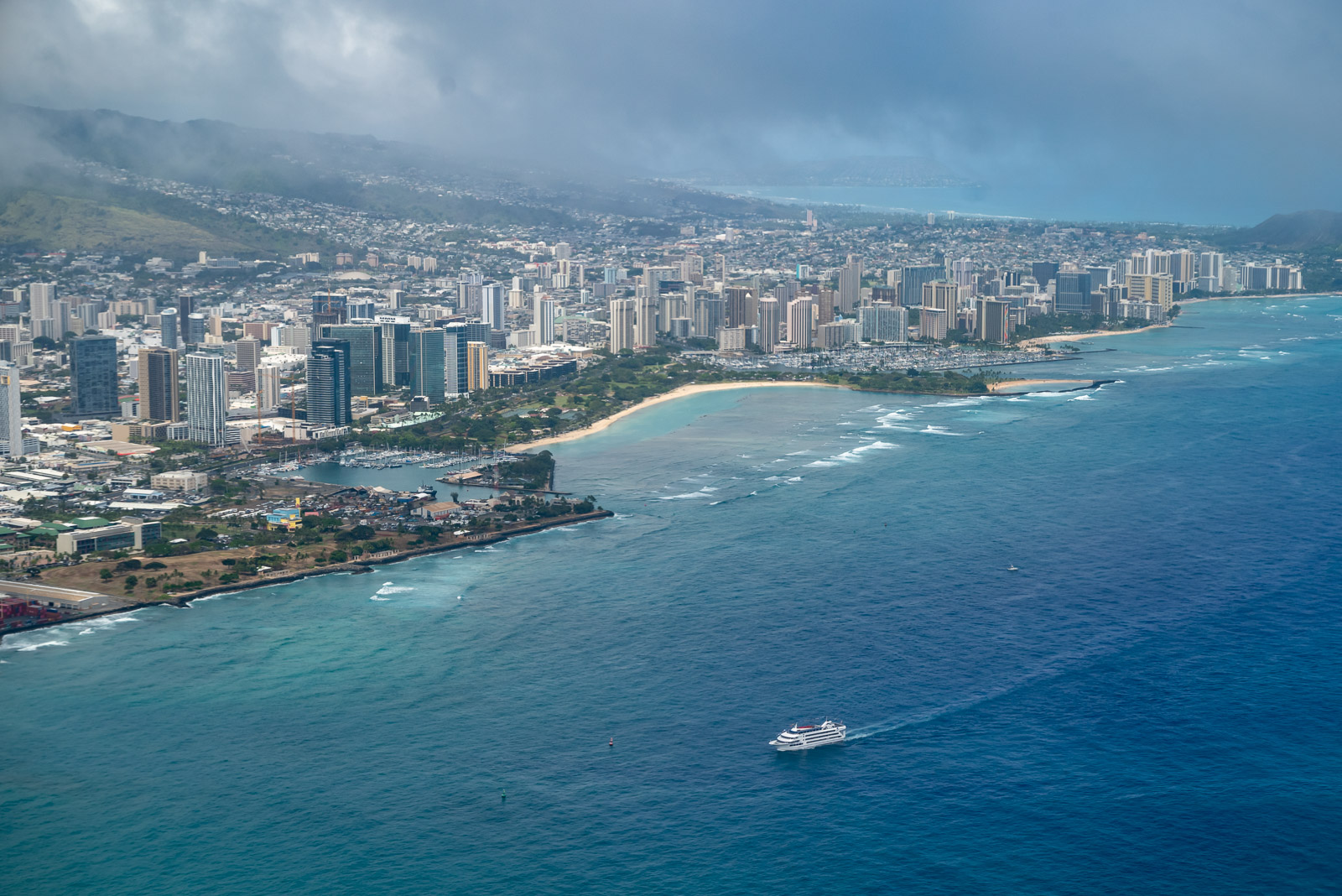 Aerial view of Honolulu shore while landing at the airport.