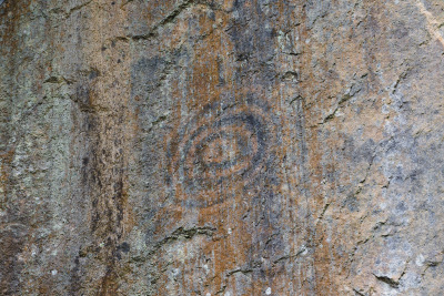 Faded Incan marking on a rock face