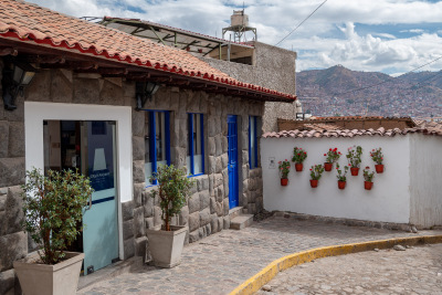 Hanging flowerpots decorate the entrance to Casa Andina, San Blas