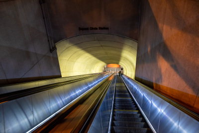 A kaleidoscope of colors fills the entrance tunnel at Dupont Circle Station.