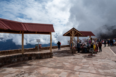 Clouds hang low at a roadside stop before descending into the sacred valley of Peru.