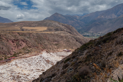 The Marasal salt mine fills a narrow valley .